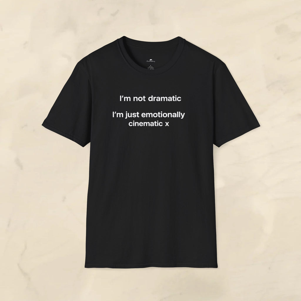 Black T-shirt with "I'm Not Dramatic, I'm Just Emotionally Cinematic" slogan in white print, casual fit, from Printify.