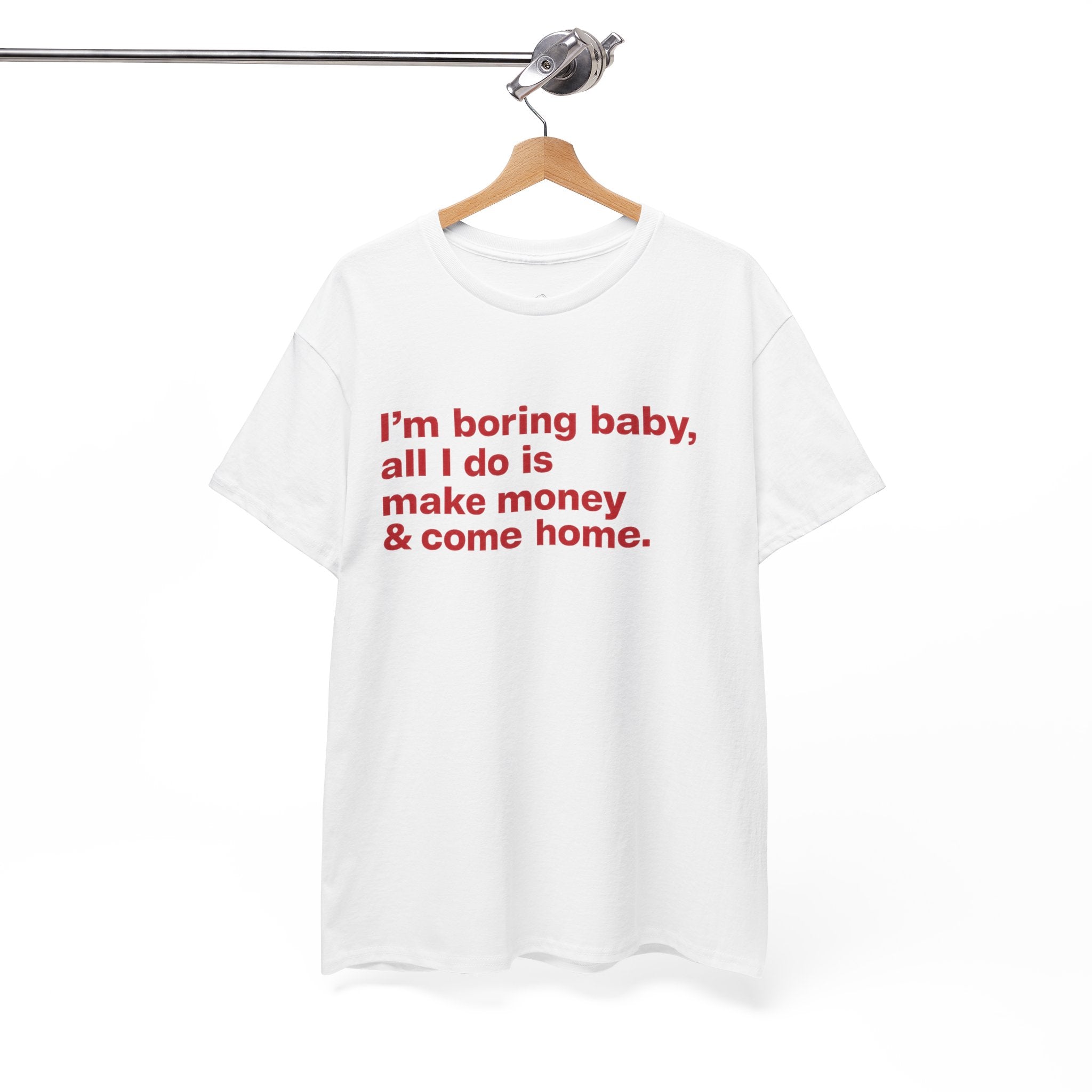 Unisex cotton T-shirt with humorous "I'm Boring Baby All I Do Is Make Money & Come Home" print, casual hustle tee by Printify.