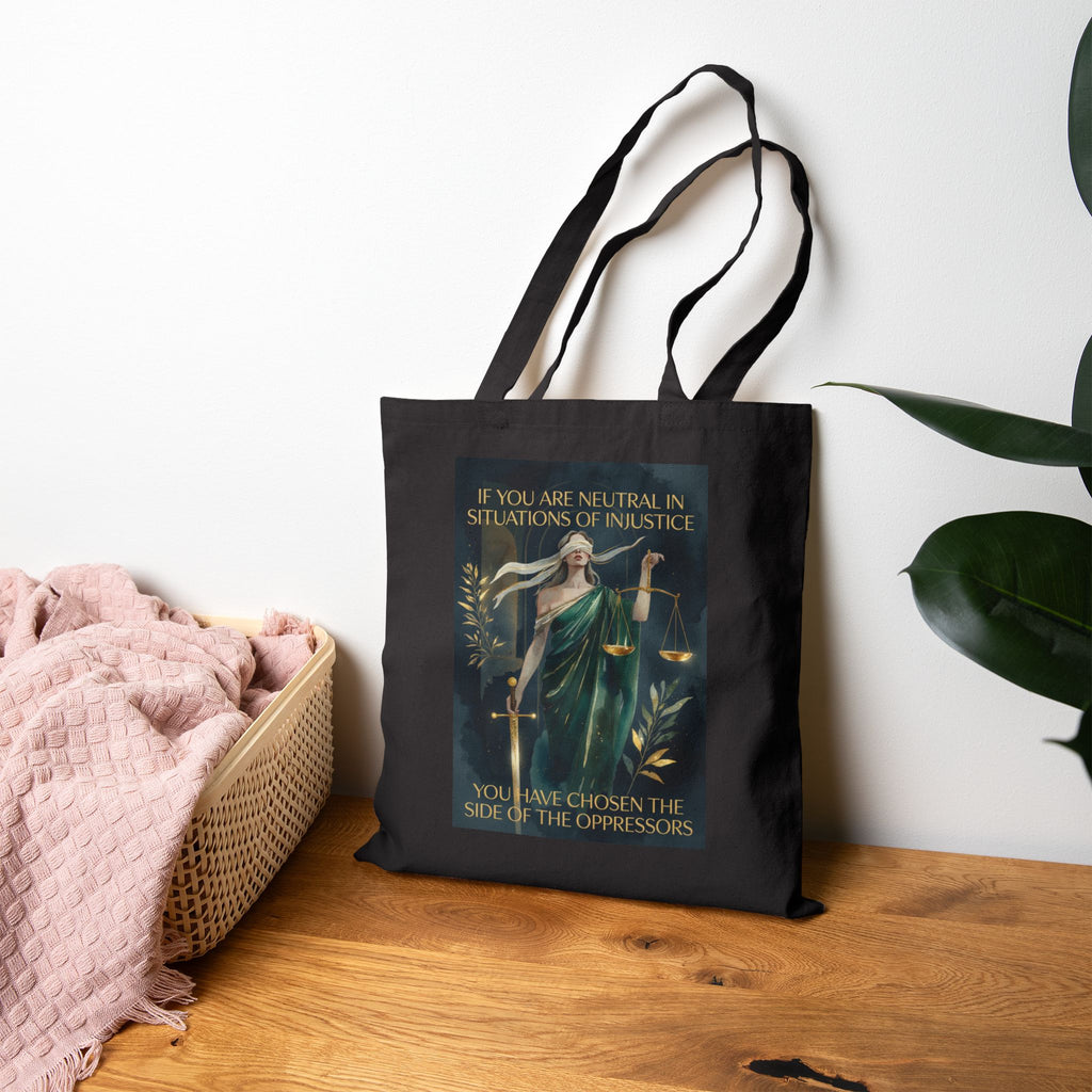 Social Justice tote bag featuring Lady Justice and the message "If You Are Neutral You Have Chosen The Oppressors" by Printify.