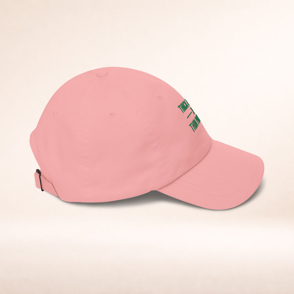 Cotton adjustable dad cap with embroidered "Thick Thighs x Thin Patience" slogan, featuring a classic hat design in natural colors.
