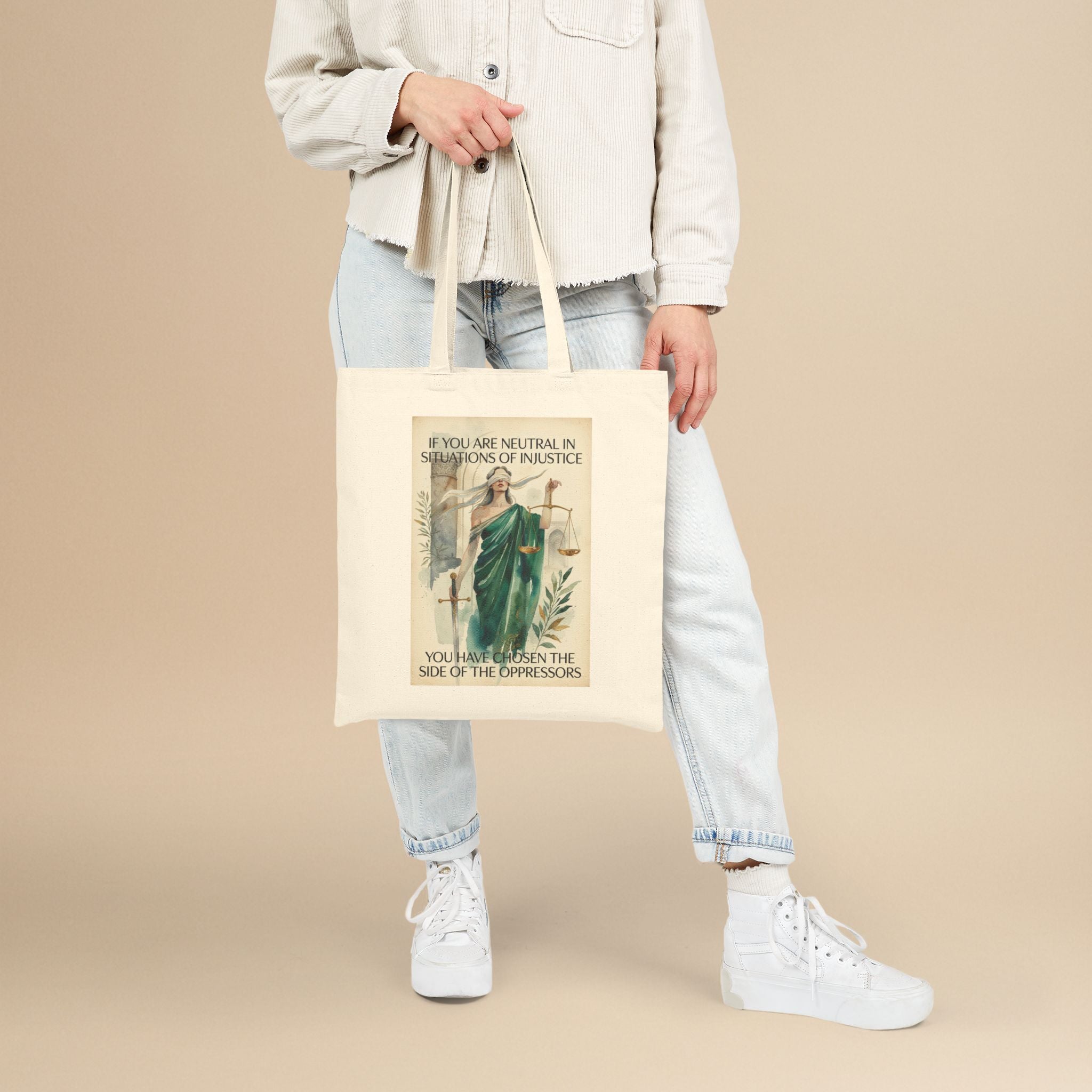 Social Justice tote bag featuring Lady Justice and the message "If you are neutral, you have chosen the oppressors," by Printify.