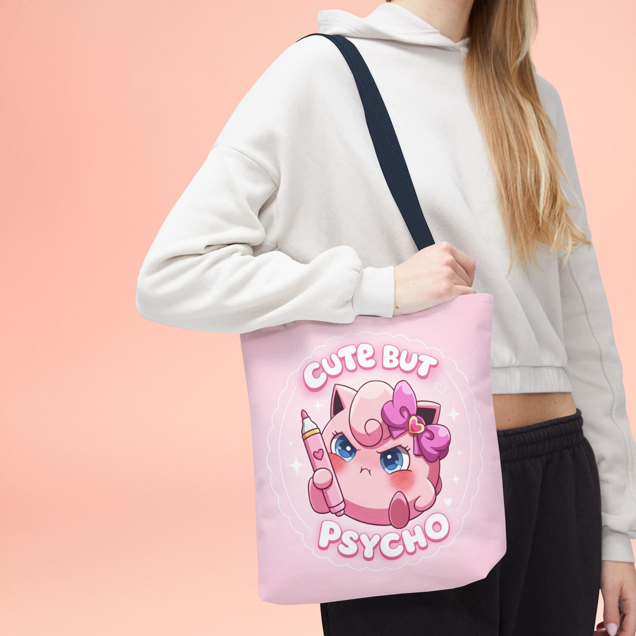 Pink "Cute But Psycho" tote bag from Printify featuring a kawaii-style design, perfect for casual shopping and everyday use.