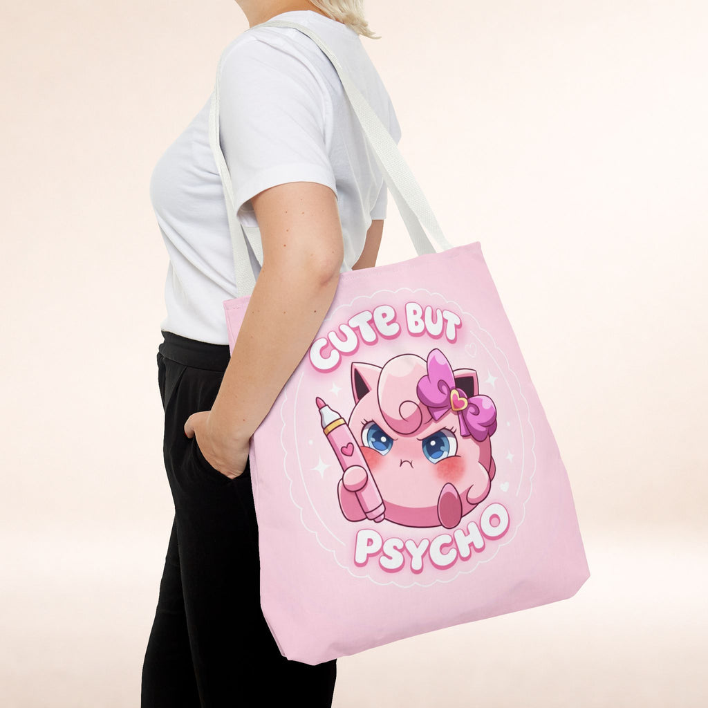 Pink "Cute But Psycho" tote bag featuring kawaii style print, casual shopper bag made by Printify.
