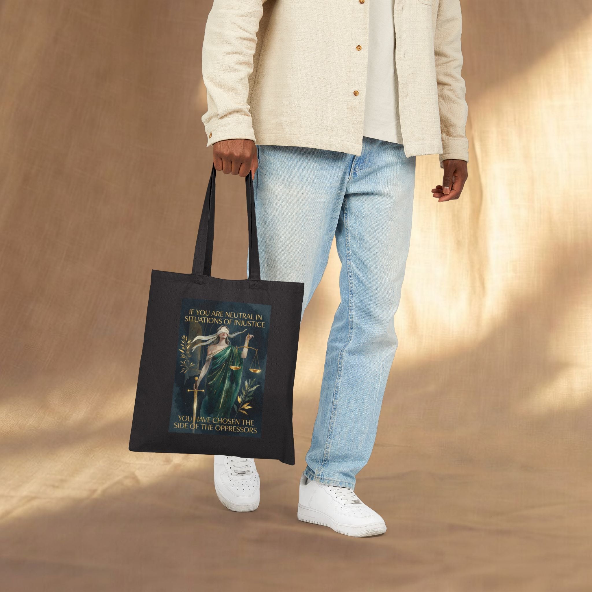Social Justice tote bag featuring Lady Justice design with the message "If You Are Neutral You Have Chosen The Oppressors" by Printify.
