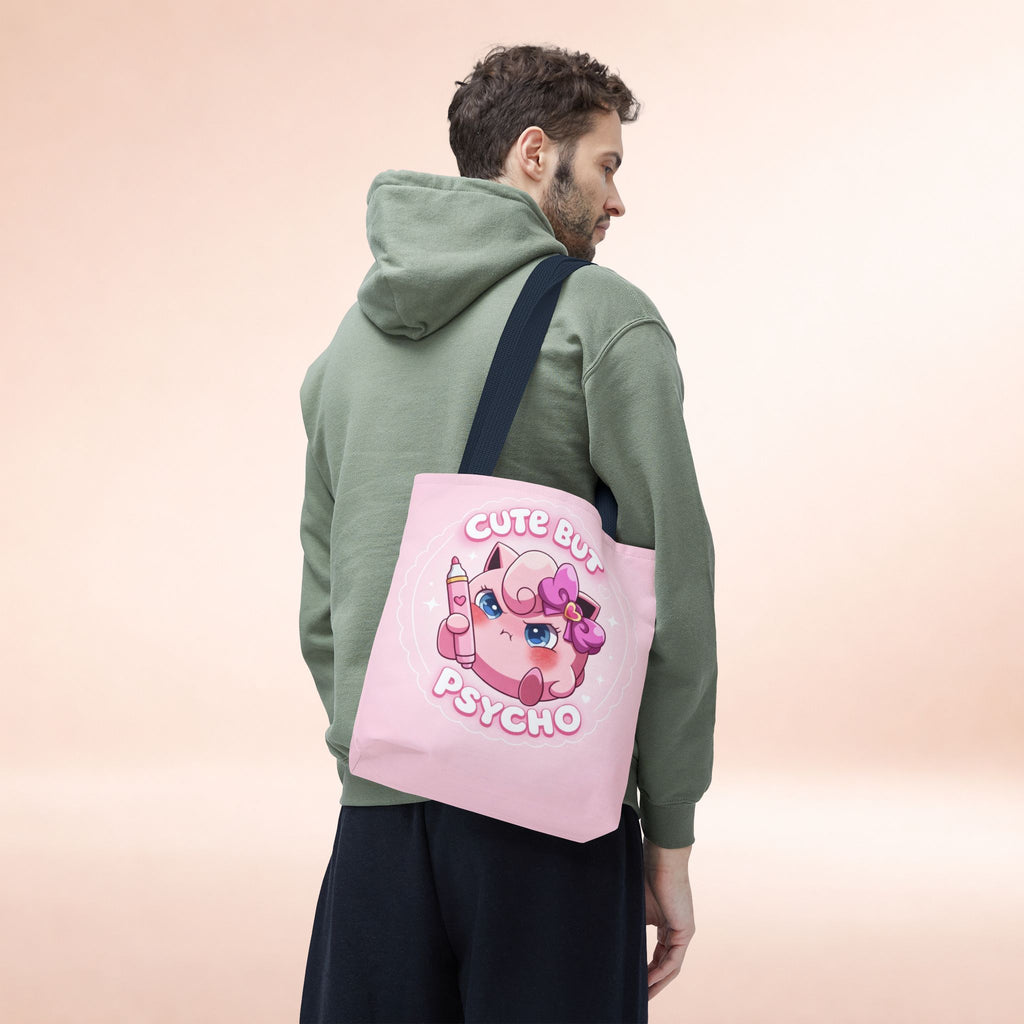 Pink "Cute But Psycho" tote bag by Printify featuring kawaii style lettering and a casual shopper design.