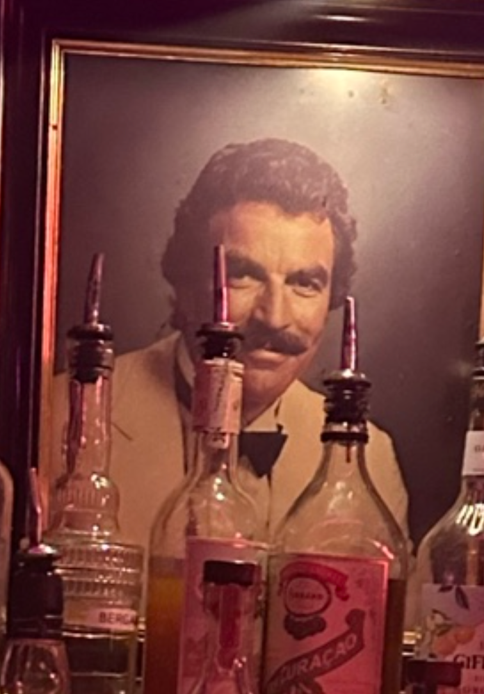 Vintage framed canvas print of a retro man cave bar decor featuring a Tom portrait with wooden frame included.