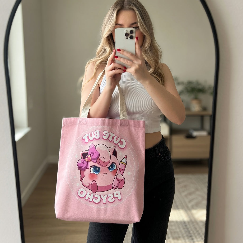 Pink "Cute But Psycho" tote bag with kawaii design, printed by Printify, featuring a stylish and playful shopping bag image.