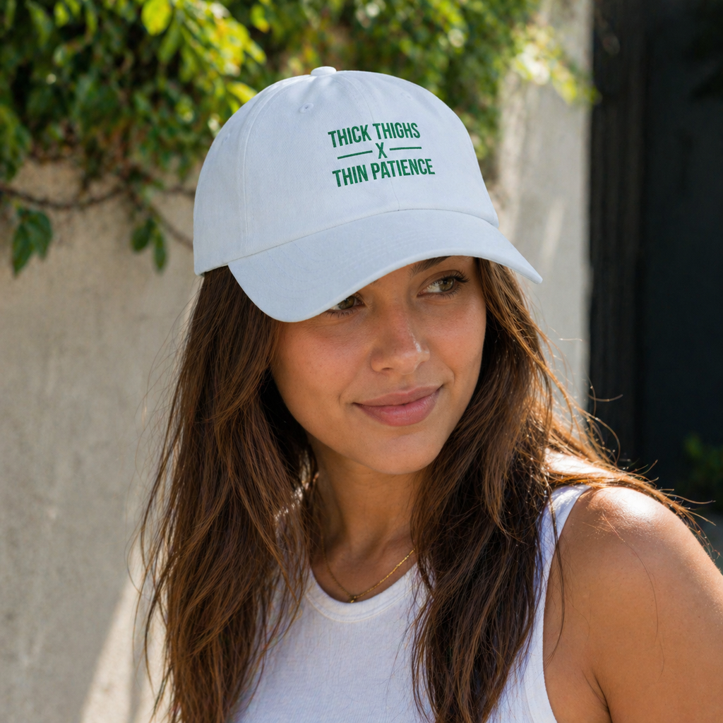 Cotton adjustable dad hat with embroidered "Thick Thighs x Thin Patience" slogan, stylish and comfortable headwear.