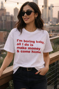 Unisex cotton T-shirt with humorous "I'm Boring Baby All I Do Is Make Money & Come Home" print, casual hustle tee by Printify