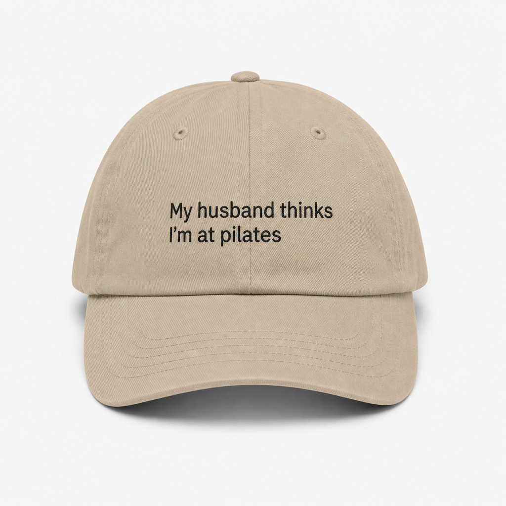 Premium embroidered "My Husband Thinks I'm At Pilates" funny low-profile baseball cap by Printify, featuring bold embroidered text.