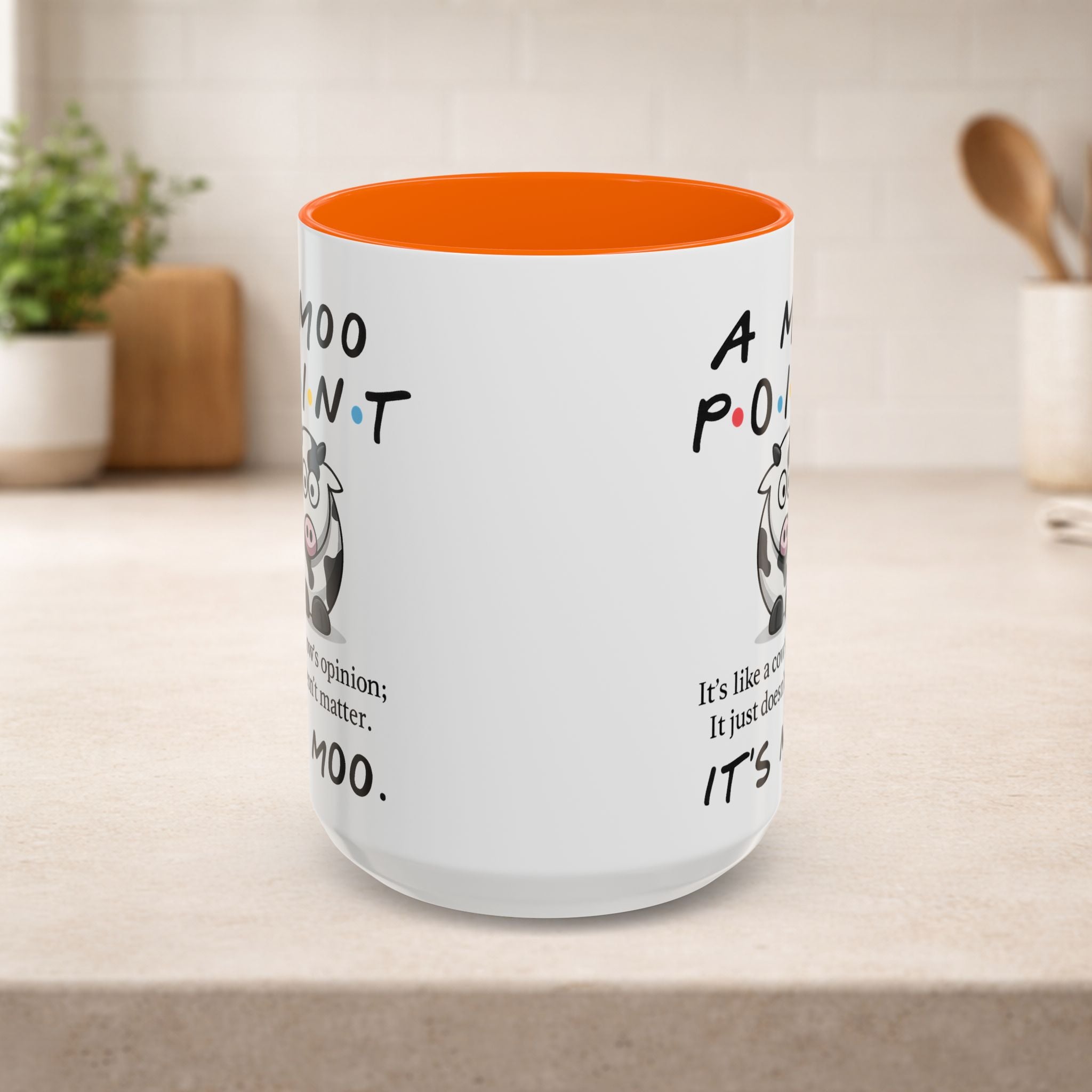 Friends Moo Point mug featuring a humorous cow illustration and the phrase "Moo Point" on a white ceramic coffee mug.