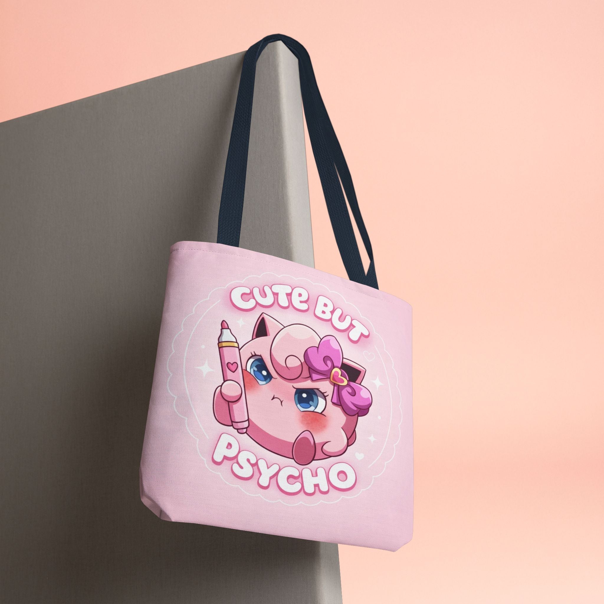 Pink "Cute But Psycho" tote bag by Printify, kawaii style shopper bag with bold black text and playful design.