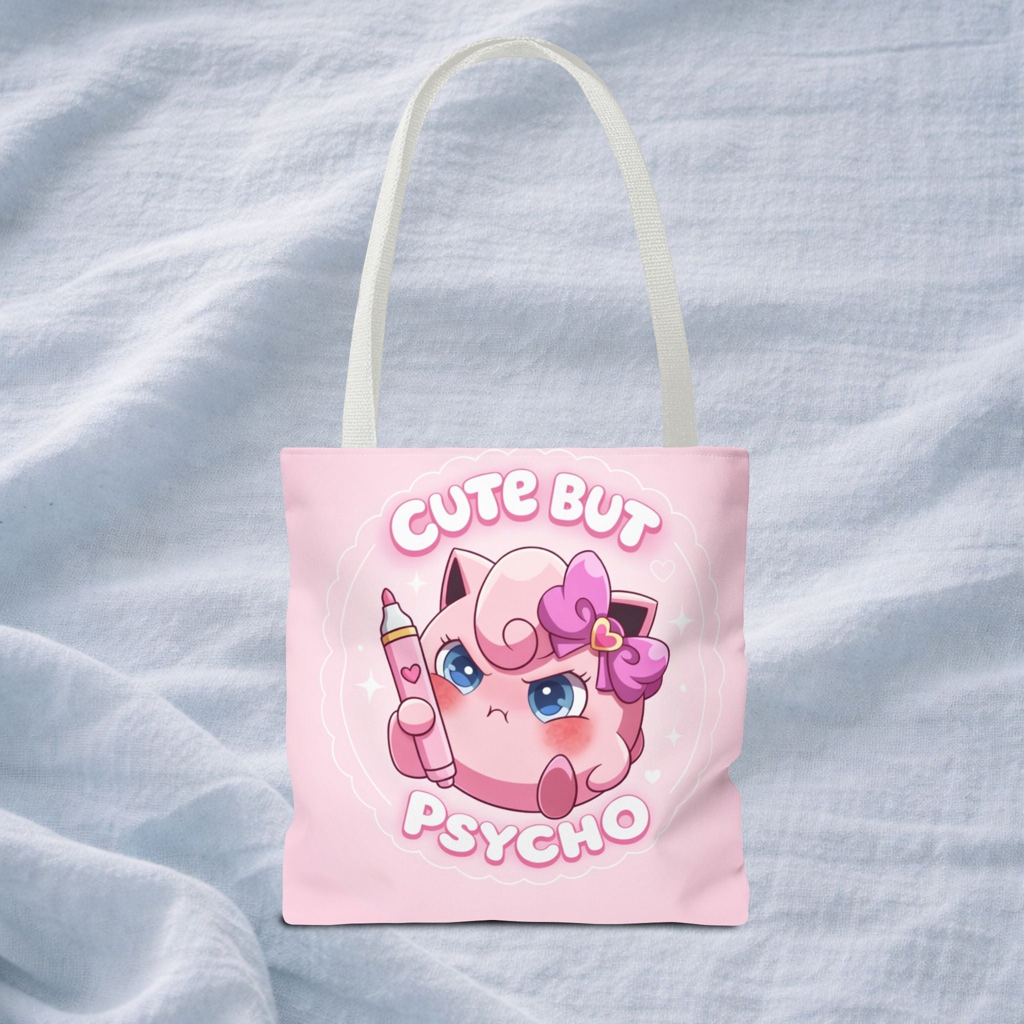 Pink "Cute But Psycho" tote bag by Printify featuring kawaii-style design, casual shopper bag for daily use.