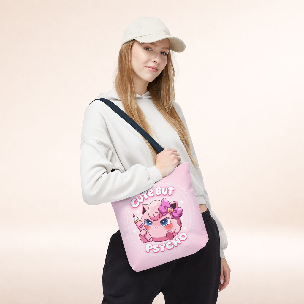 Pink "Cute But Psycho" tote bag by Printify, kawaii style shopper bag with bold text and playful design on fabric.