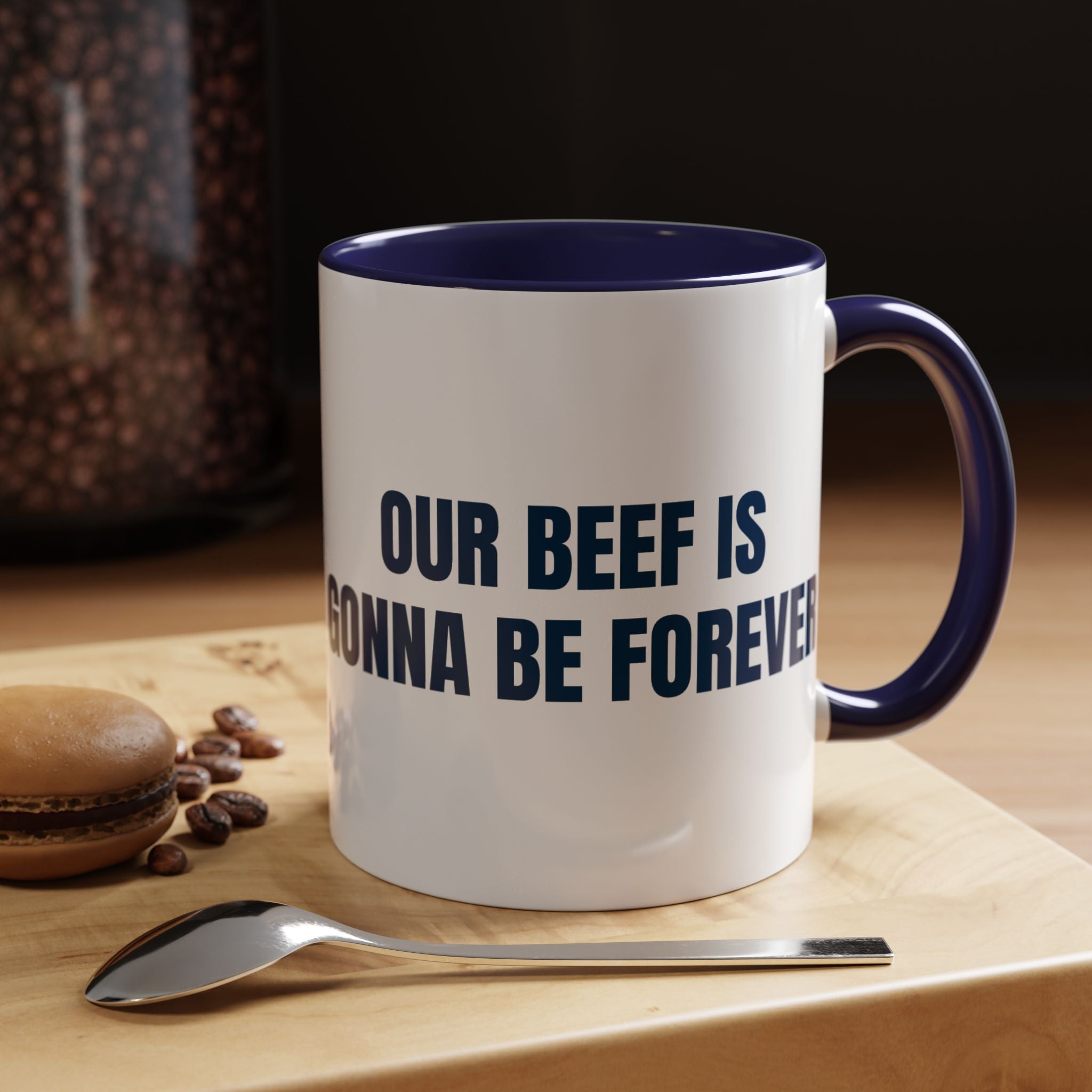 Black ceramic coffee mug with humorous white text saying "Our Beef Is Gonna Be Forever," 11oz or 15oz size.