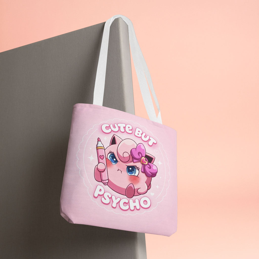 Pink "Cute But Psycho" tote bag by Printify, kawaii style shopper bag with bold text and playful design.