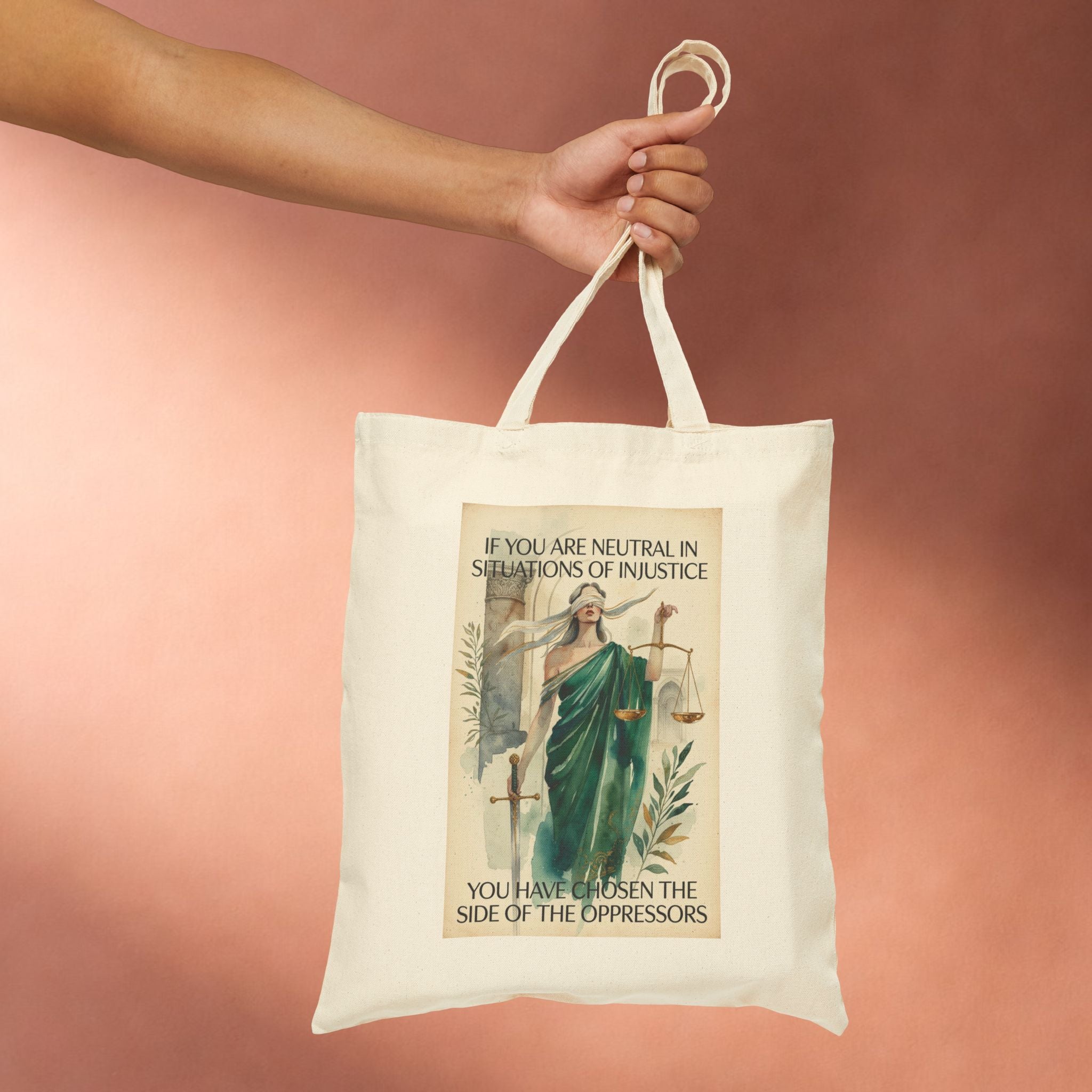 Social Justice tote bag featuring Lady Justice design with the message "If you are neutral you have chosen the oppressors" by Printify.