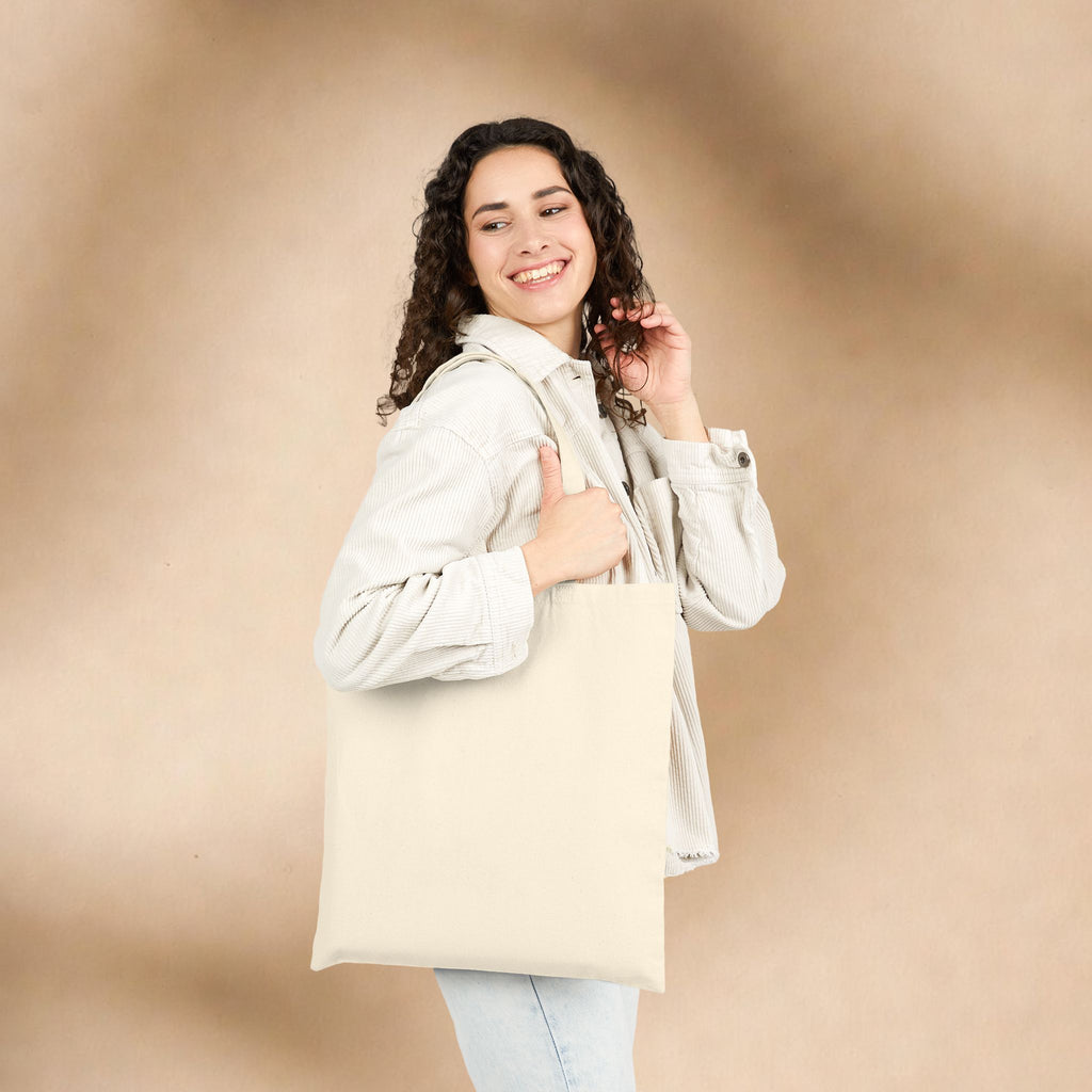Black tote bag featuring white text "If you are neutral you have chosen the oppressors" and Lady Justice graphic, activist design.
