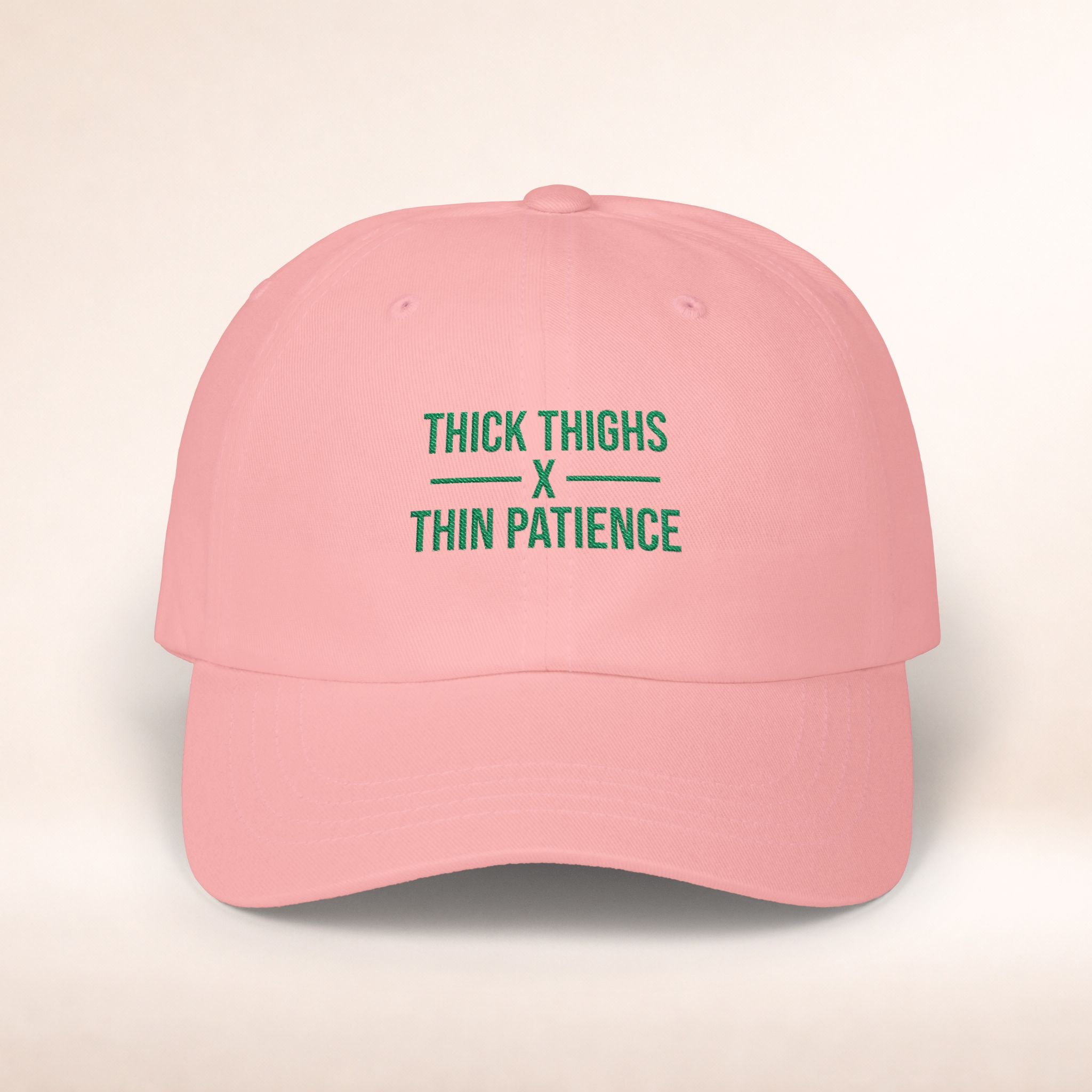 Cotton adjustable dad hat with embroidered "Thick Thighs x Thin Patience" design, in a casual style.