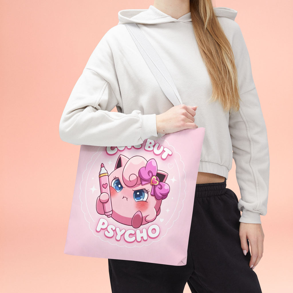 Pink "Cute But Psycho" tote bag by Printify featuring a kawaii style design, perfect for casual shopping and everyday use.