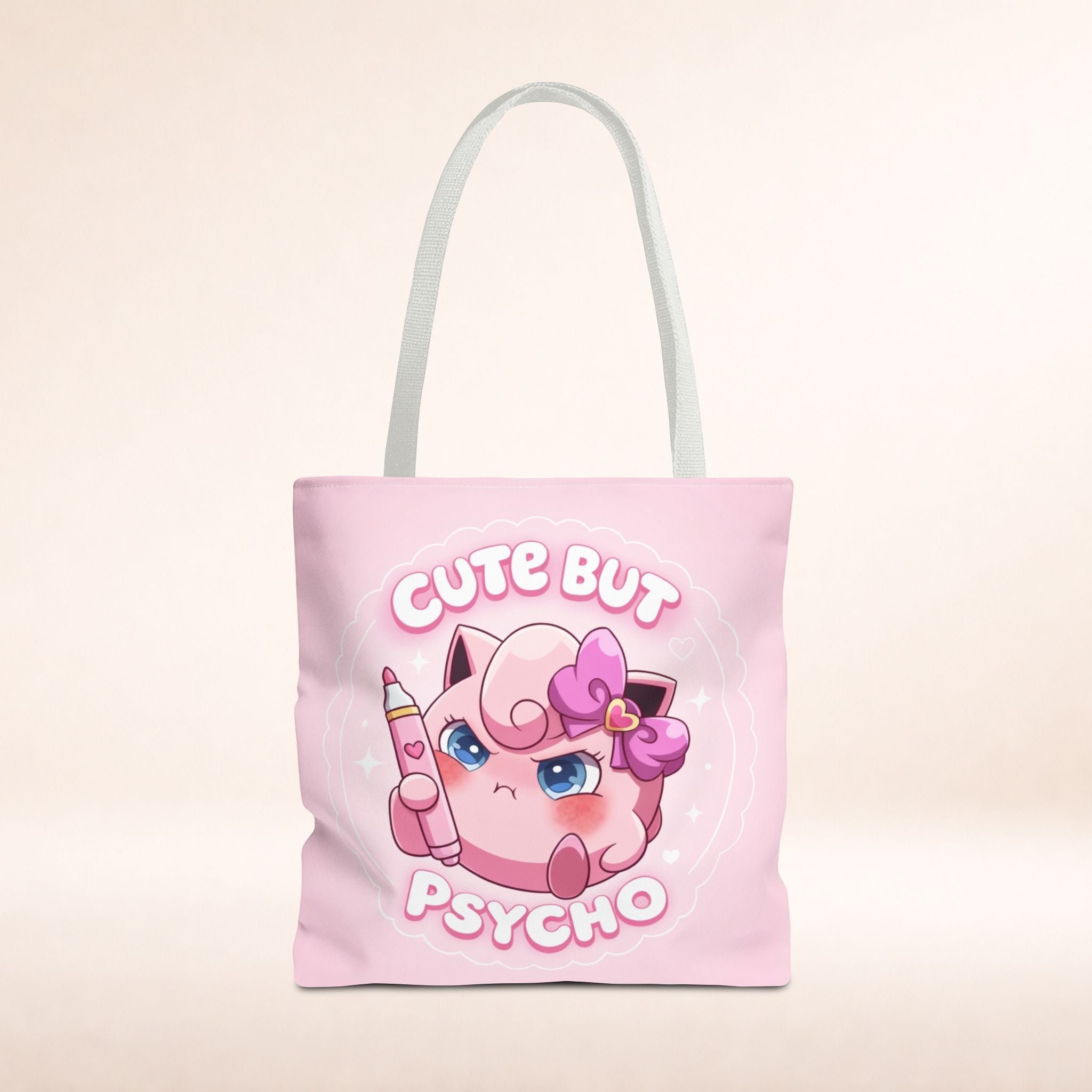 Pink "Cute But Psycho" tote bag by Printify, kawaii style shopper with bold text design and spacious fabric for everyday use.
