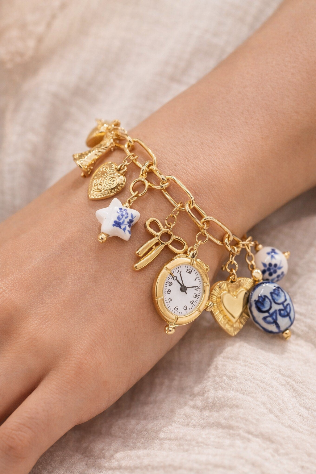 Blue ceramic faux watch charm necklace by CloudRaspberry Studio, featuring gold porcelain accents in a stylish jewelry set.