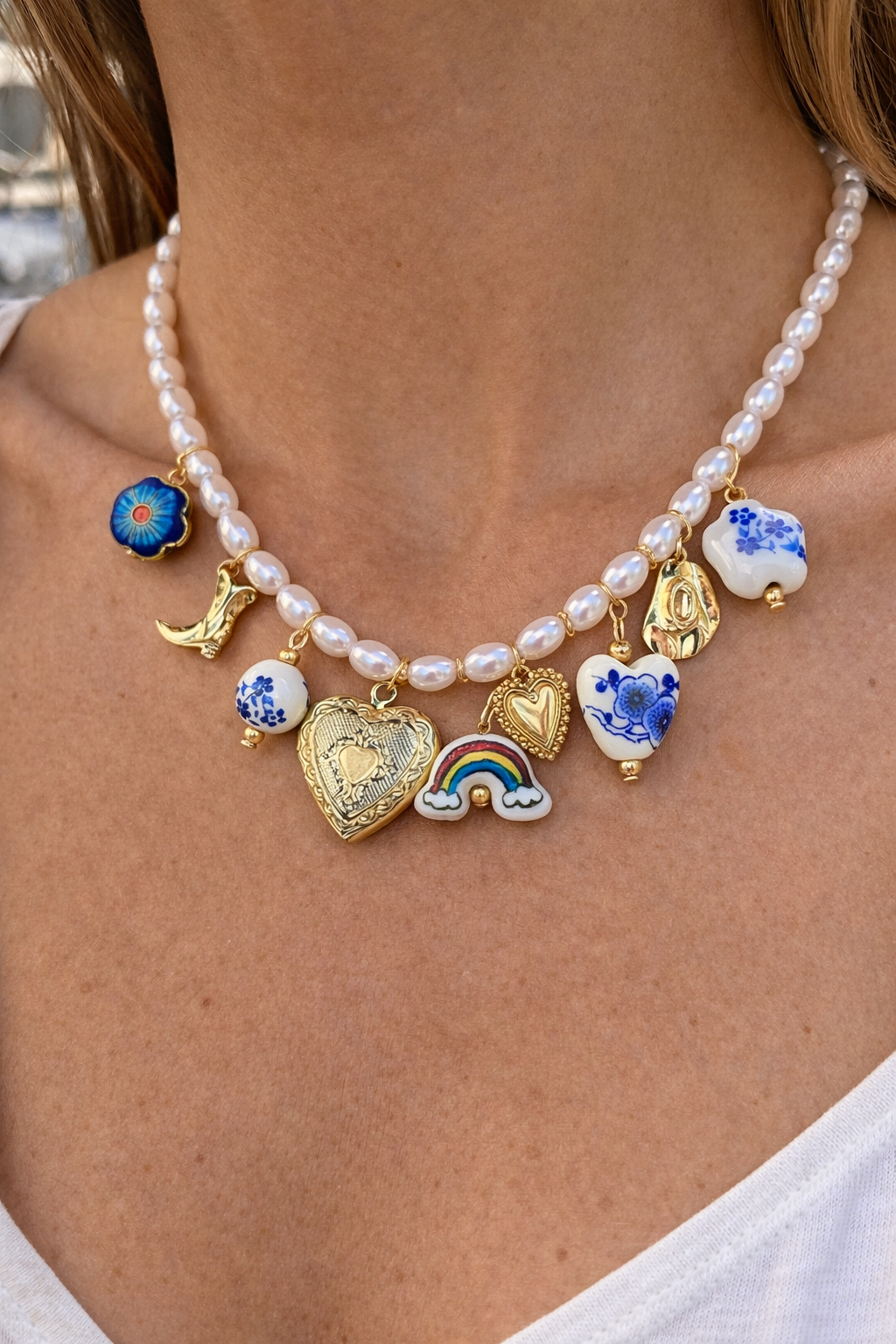 Blue floral cowboy charms necklace by CloudRaspberry Studio featuring boho pearl and ceramic charm design.