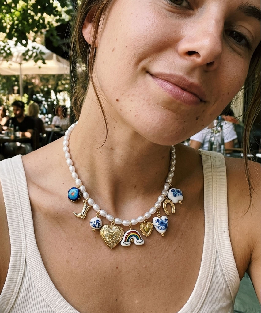 Blue boho pearl and ceramic charm necklace by CloudRaspberry Studio featuring floral and cowboy charms, perfect as a set or separate.