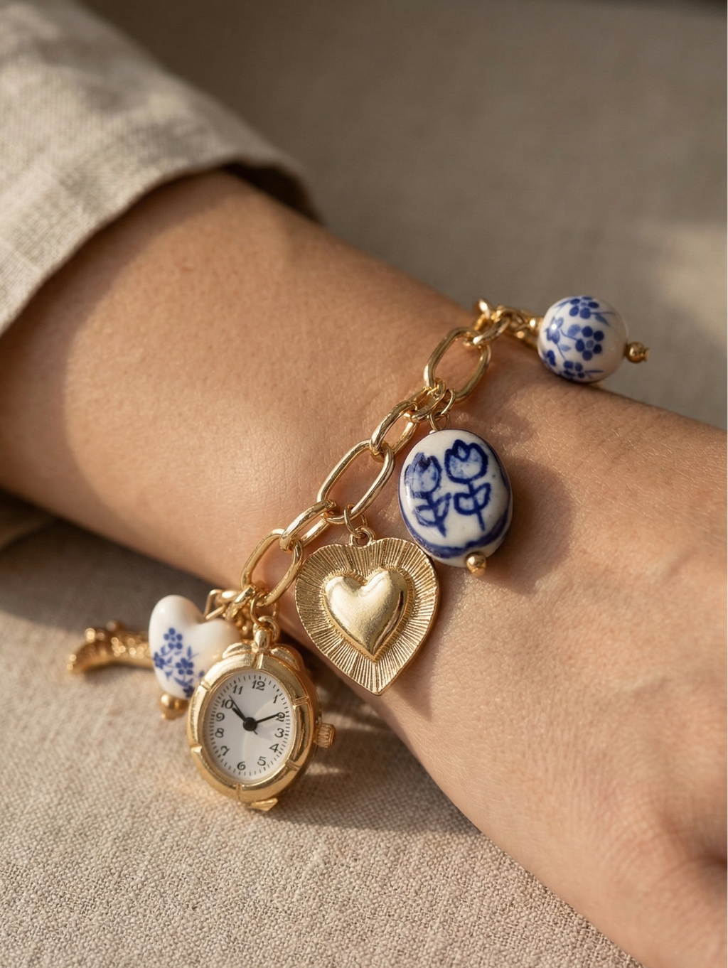 Blue ceramic faux watch charm necklace from CloudRaspberry Studio, featuring gold porcelain accents, part of a matching jewelry set.