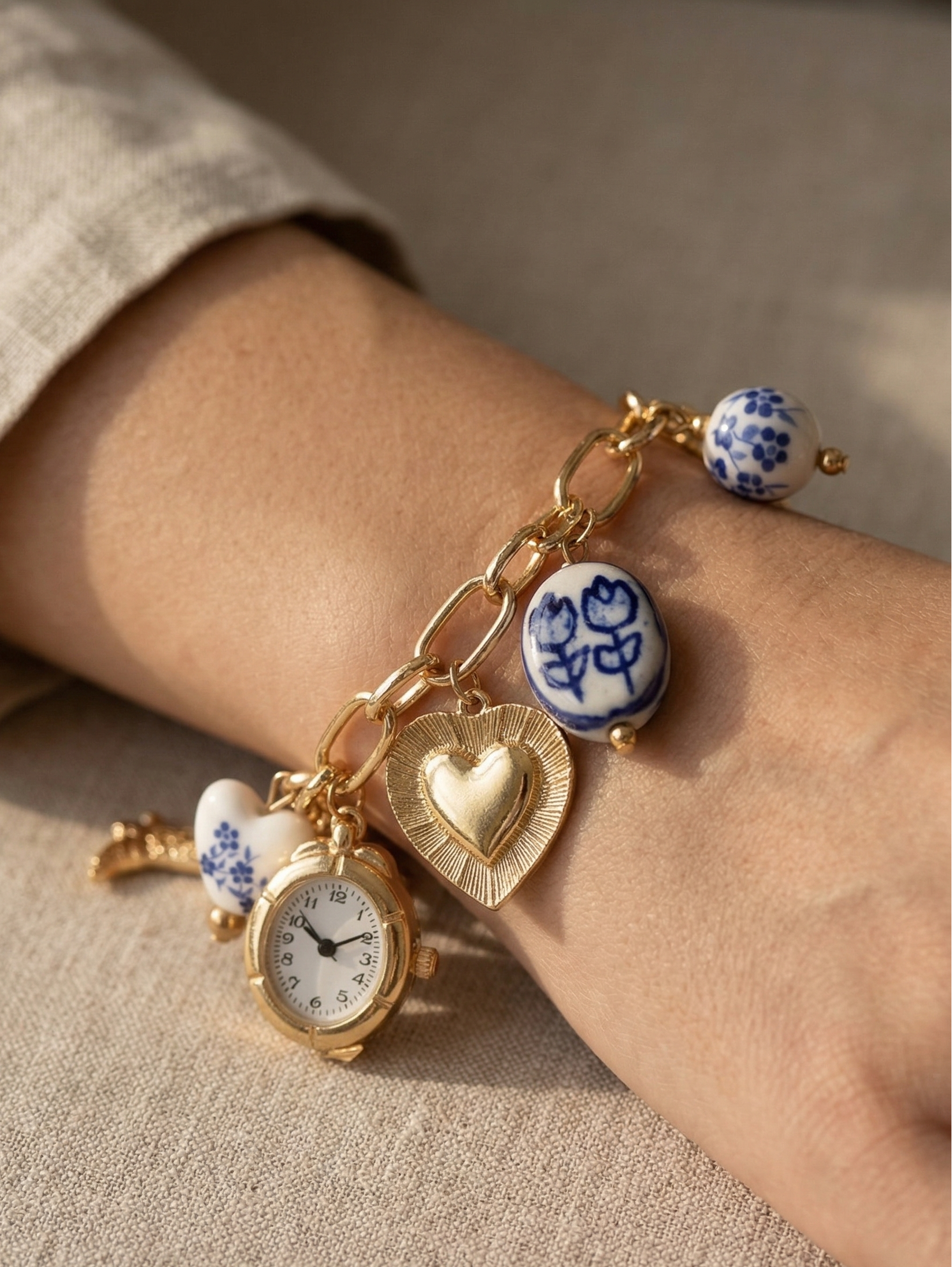 Blue ceramic faux watch charm necklace from CloudRaspberry Studio, featuring gold porcelain accents, part of a matching jewelry set.