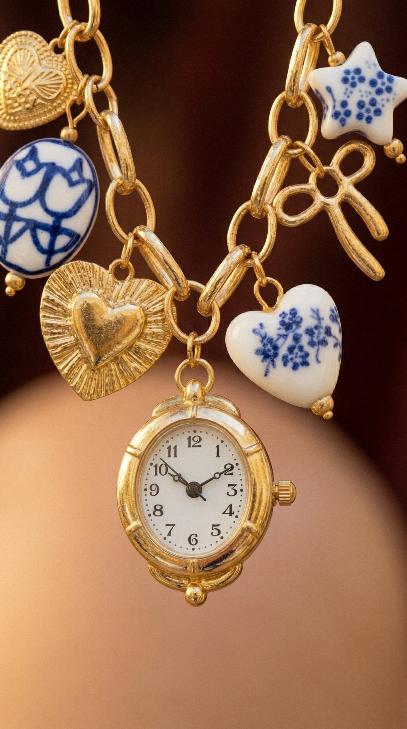 Blue ceramic watch charm necklace and bracelet set by CloudRaspberry Studio featuring gold porcelain accents and Gemini-inspired design.