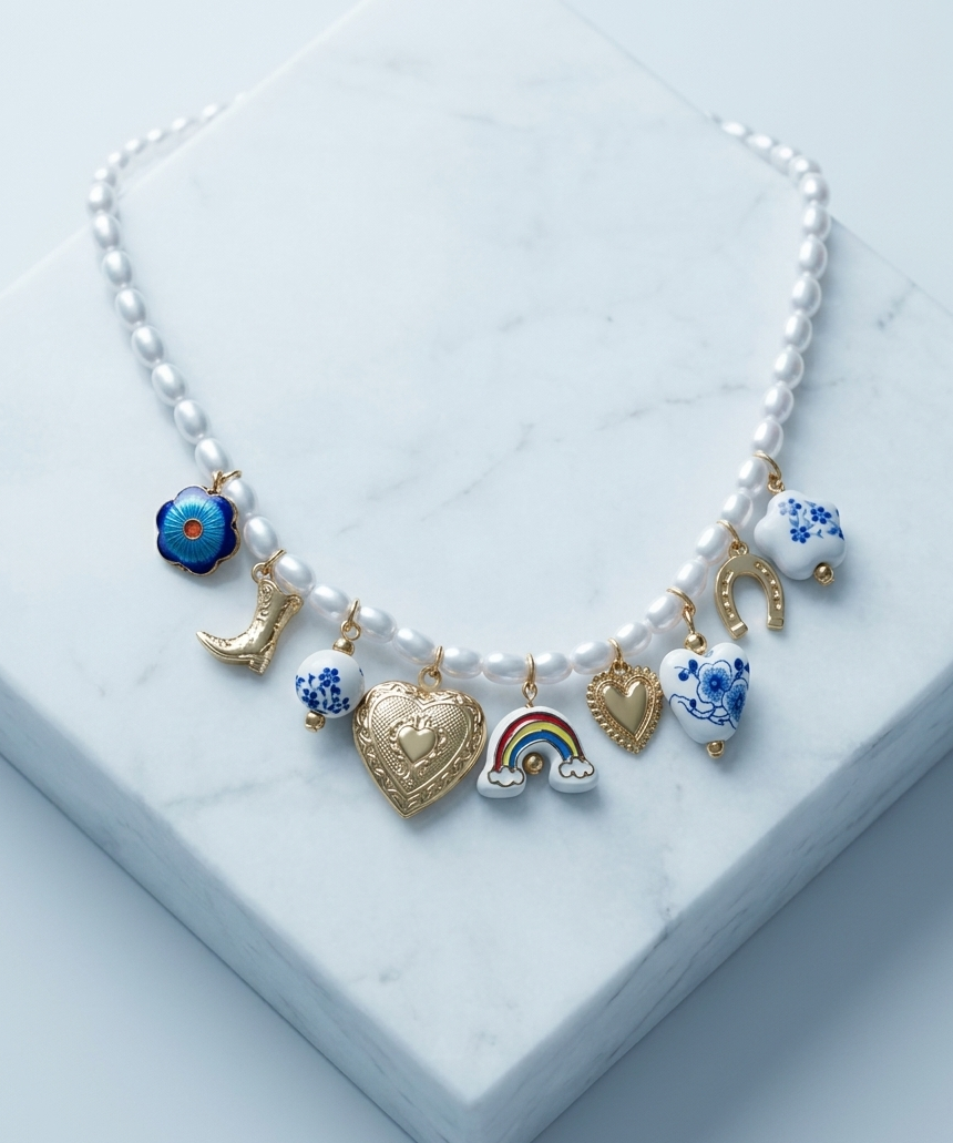Blue boho pearl and ceramic charm necklace featuring floral cowboy accents from CloudRaspberry Studio.